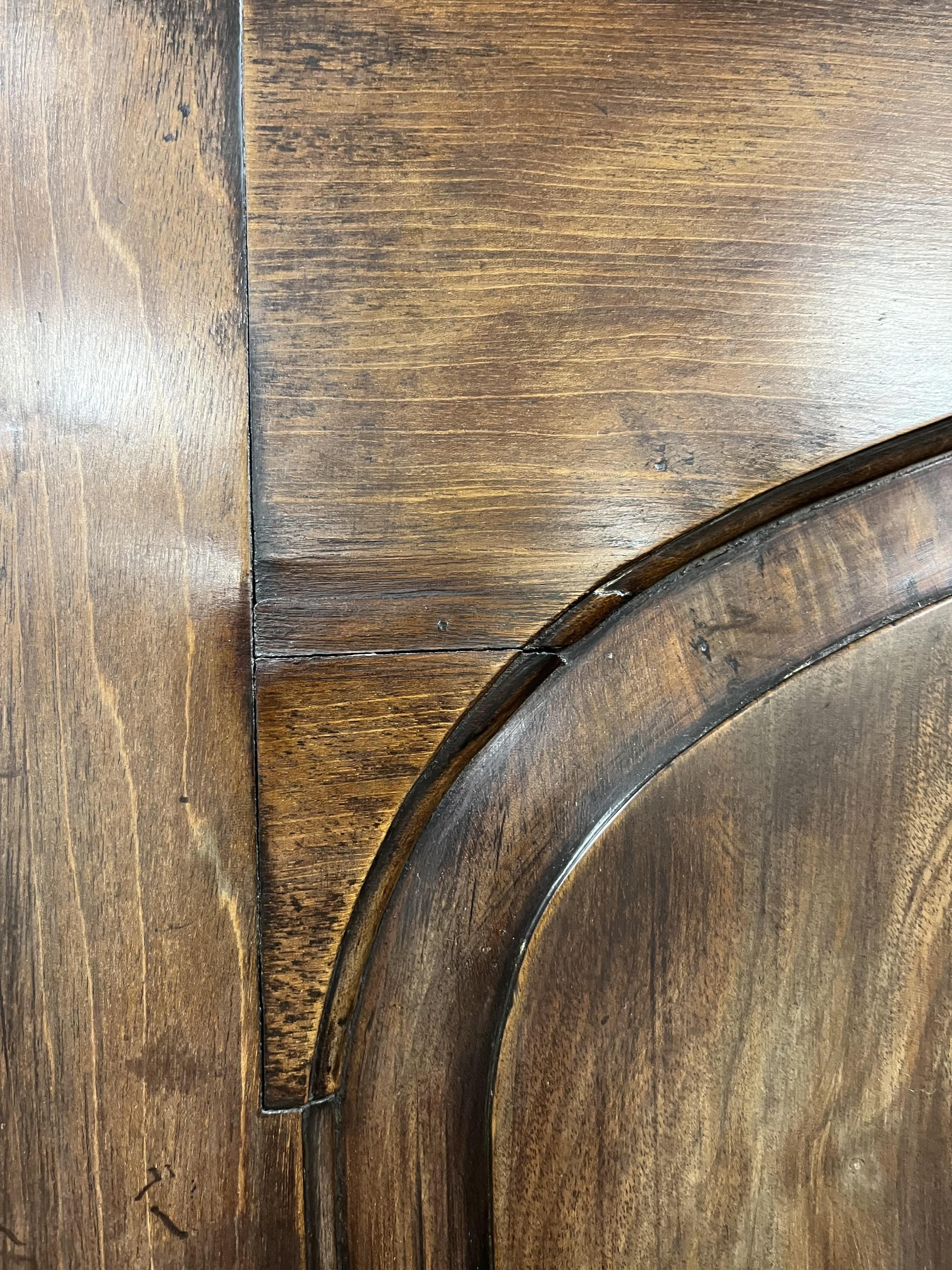 A small George III mahogany bureau cabinet with broken arch pediment, width 95cm, depth 62cm, height 198cm